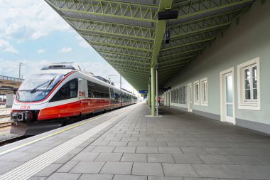 Villach, Austria. July 18 2023. a train on the platform of the central station in the city centre