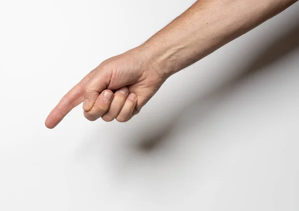 Mužská Ruka Ukazující Prstem Bílém Pozadí — Stock fotografie