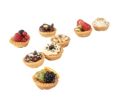 beyaz bir yüzeyüzerinde bazı karışık yuvarlak hamur işleri