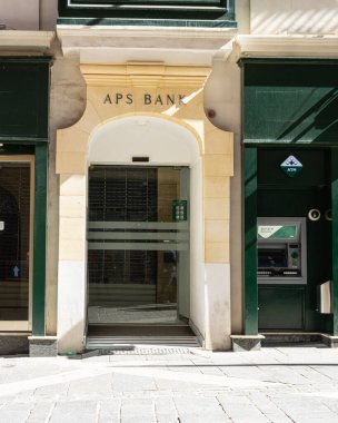 Valletta, Malta, April 03, 2024. External view of the APS Bank branch entrance in the city center clipart