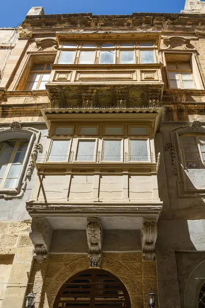 stock image Valletta, Malta, April 03, 2024. view of the typical wooden balconies in the old buildings in the city center