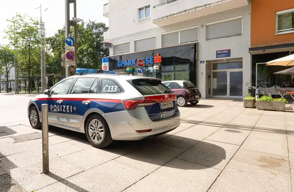 stock image Salzburg, Austria. June 30, 2024. a police car parked outside the police station in the city centre