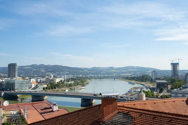 Stock image Linz, Austria. August 12, 2024.  panoramic view of the Danube River and the city from the Castle Hill