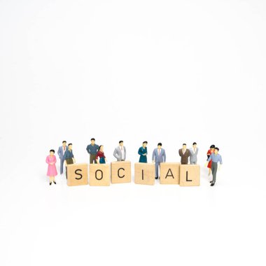 the word social between some small dummies clipart