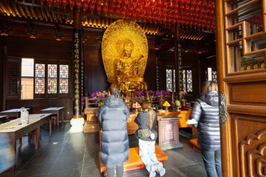 Shanghai, China. January 7, 2025.  view of the faithful in the Jade Buddha Temple  on the city cente clipart