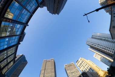 Shanghai, China. January 10, 2025. panoramic view from below of modern skyscrapers in the city center clipart