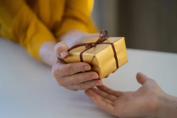 Female Hands Hold Gift Closeup Top View Young Girl Gives — 图库照片