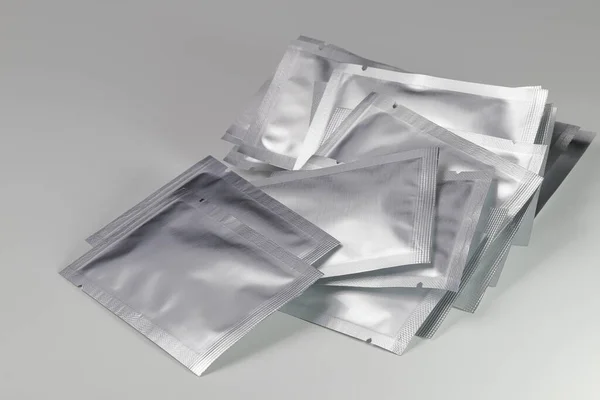 sheet foil package. silver plastic sachet mockup sample. Siver pouch, skin mask packaging design. Food zipper bag template, aluminum paper wrapper.