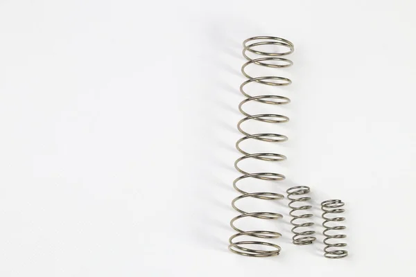 Various Metal Springs Different Purposes Many Small Chrome Springs Metal — Stock Photo, Image