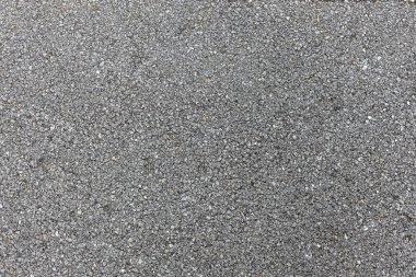 Koyu desenli asfalt siyah arkaplan, asfalt yüzeyli grunge pürüzsüz asfalt koyu gri yol, desenli arkaplan.