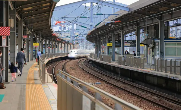 stock image People waiting for transportation at HAKATA Station.