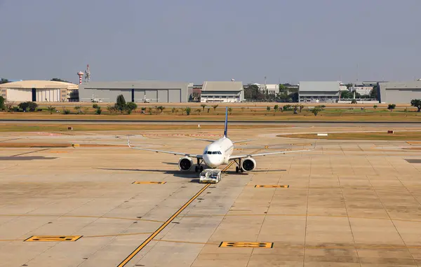 stock image Airplane Tugs, Machine for push back the aircraft to taxiway in ground handling services.