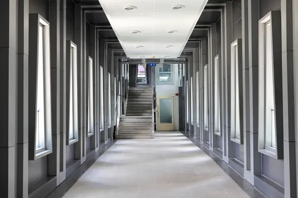 Stock image Pedestrian pathway or corridor or hallway between train station and other building.