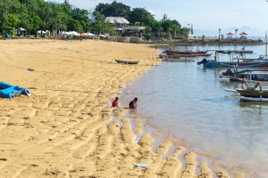 Sanur, Bali (2 February 2023) : Fishing boats are moored on the beach
