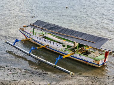 Bima, West Nusa Tenggara (October 27, 2024): Fishing vessel owned by an oil company (Pertamina) clipart