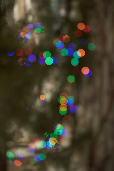 Colorful blurred bokeh background, glitter, light effect, party. Blurred light abstract background with bokeh defocused lights. Christmas time