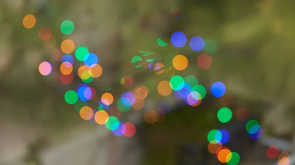 Colorful blurred bokeh background, glitter, light effect, party. Blurred light abstract background with bokeh defocused lights. Christmas time