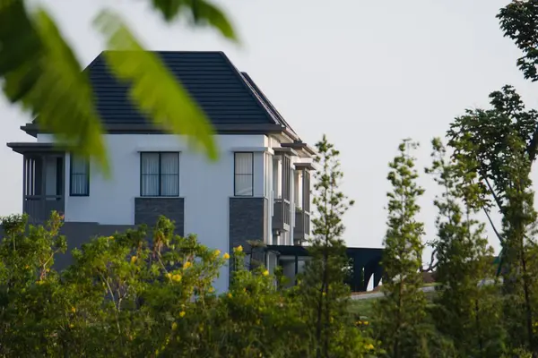 stock image new housing, surrounded by green and lush plants, Bogor, Indonesia, August 04, 2024