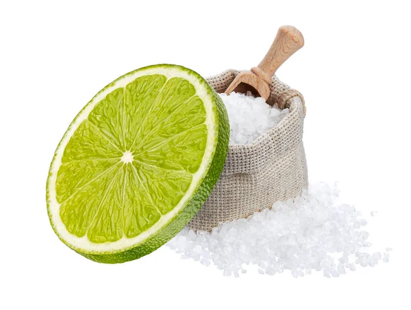 Lime slice with salt, classic margarita cocktail ingredients isolated on white background with clipping path