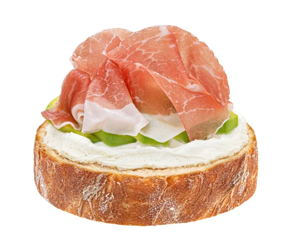 stock image Prosciutto crudo sandwich, spanish jamon on toasted bread slice, serrano ham bruschetta isolated on white background