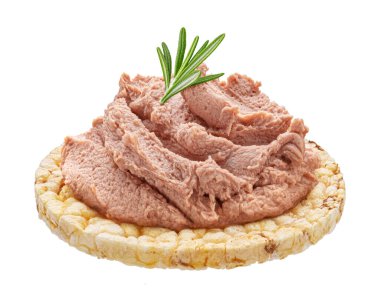 Liver pate on puffed rice cake isolated on white background with clipping path, full depth of field clipart