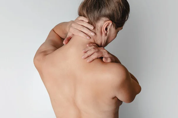 Pain Neck Bare Back Pleats Rear View Middle Aged Woman — Stock Photo, Image