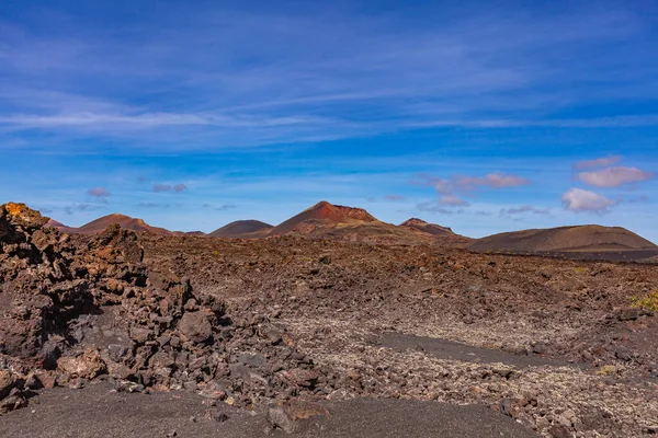 Stock image Lava of extinct volcano in valley on the Canary Island. Volcanic coast. Tourism.