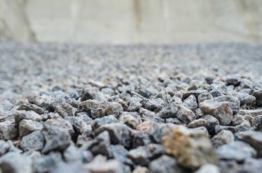 Güzel çakıl. Yol inşaatı ve kaldırım taşları için arka plan taşı.