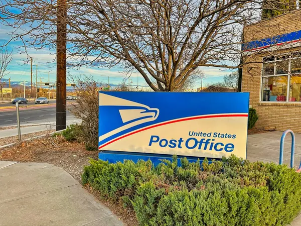 stock image ALBUQUERQUE, NEW MEXICO, USA - March 8, 2023. United States Postal Service sign and logo