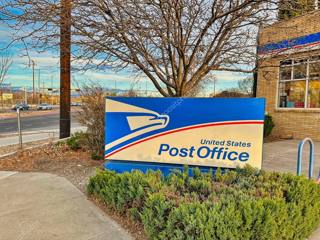 ALBUQUERQUE, NEW MEXICO, USA - March 8, 2023. United States Postal Service sign and logo