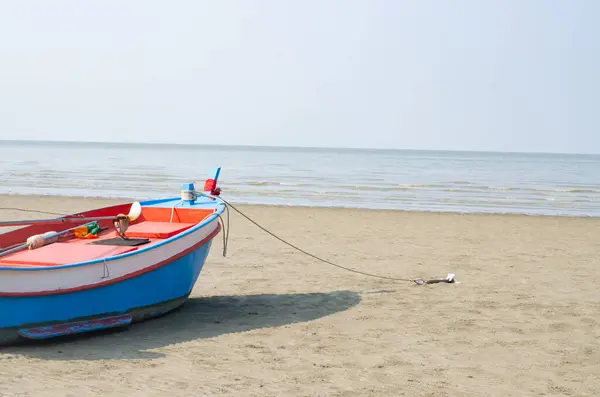 stock image Colorful wooden fishing boats on the beach.