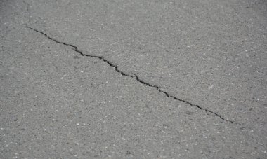 Crack on the asphalt road.