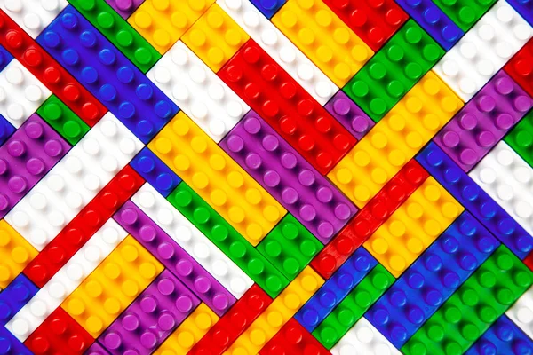 Renkli Yapı Bloklarının Soyut Arkaplan Dokusu Nşaatçının Renkli Plastik Parçalarının — Stok fotoğraf