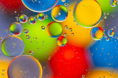 Bulanık arka planda soyut renkli yağlı sıvı topları. soyut arkaplan dokusu