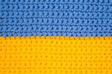 knitted scarf in the form of the Ukrainian flag. national symbols of the country Ukraine