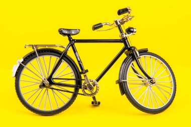 road bike model on a yellow background. transport for travel