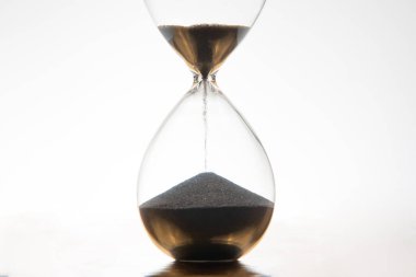 hourglass on a light background. time and minute measurement