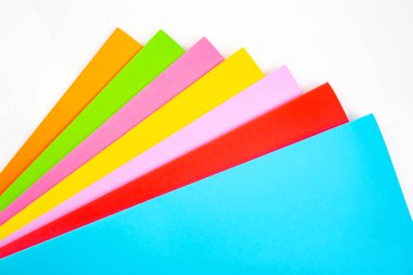 Colored paper set. creativity and creativity. background geometric abstraction