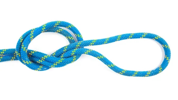 stock image durable colored rope for climbing equipment on a white background. knot of braided cable. item for tourism and travel