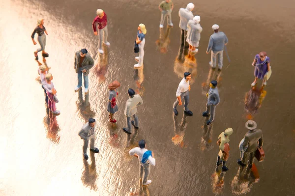 stock image miniature people. different people communicate with each other. communication of society of different generations