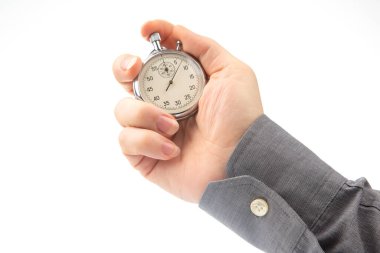 hand with a mechanical analog stopwatch on a white background. Time part precision. Measurement of the speed interval