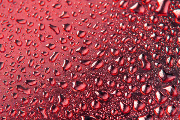 Druppels Water Een Gekleurde Achtergrond Abstracte Textuur — Stockfoto