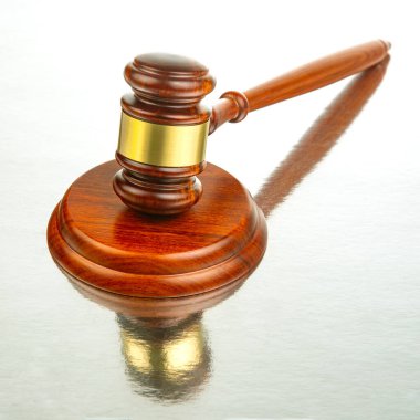 wooden hammer for auctions, bidding and judicial law. symbol of justice and verdict