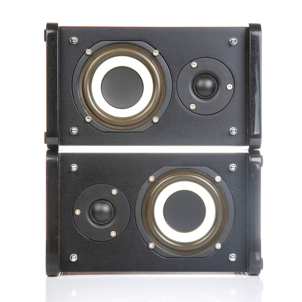 Two stereo audio speakers on a white background. sound and media