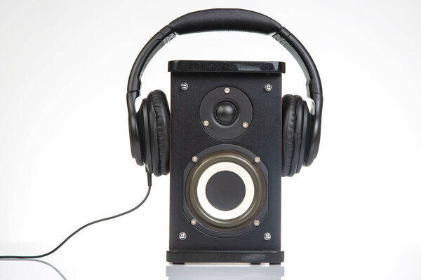 Audio speakers and headphones on a white background. sound and media