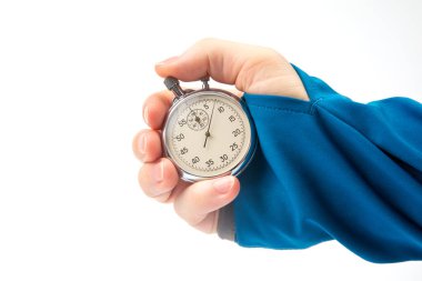 hand with a mechanical analog stopwatch on a white background. Time part precision. Measurement of the speed interval