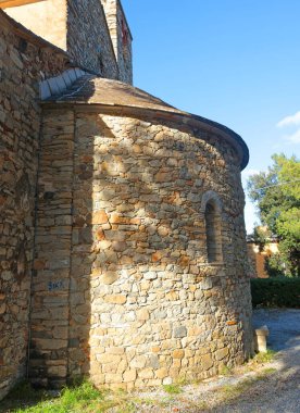 Stone medieval tower on mountain on sunny day. Liguria and traditional historic old building. Sestri Levante, town near sea. High quality photo clipart