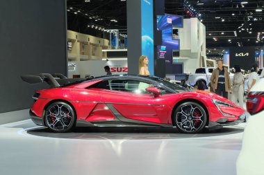 Nonthaburi, Thailand - April 6, 2024: BYDs YangWang U9, an all-electric supercar, launched at 236,000 USD: 0-100 km within in 2.36s with an LFP battery in Bangkok Motor Show 2024. clipart