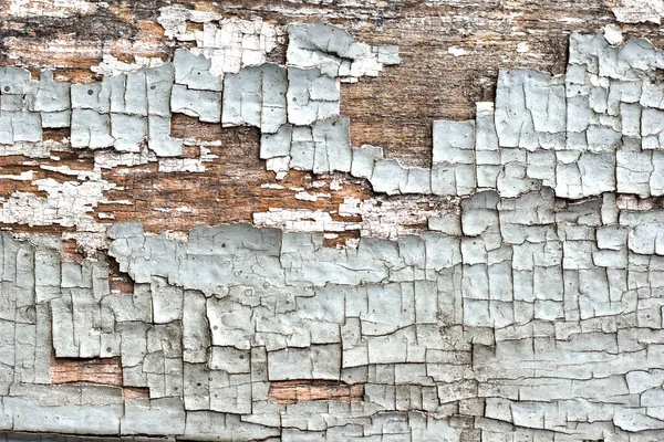 带有多层涂料的开裂老木的抽象背景 — 图库照片