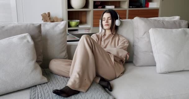 Mindful Young Happy Woman Wearing Wireless Headphones Listening Relaxing Music — 비디오